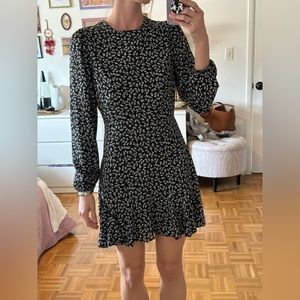 Row A long sleeve black dress with white flowers